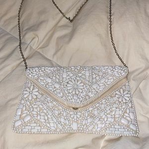 White beaded clutch purse.
